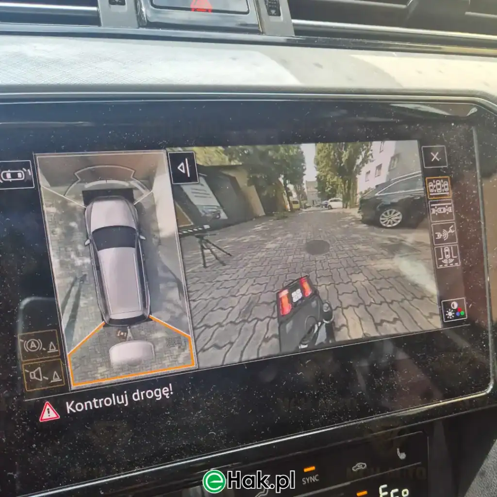 montaż haka holowniczego vw passat gte